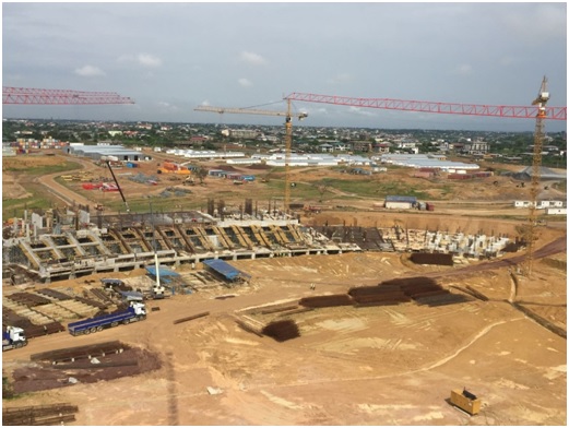 Same view of previous picture, West grandstands under construction